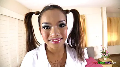 Adorable Thai teen with pigtails craves a satisfying encounter