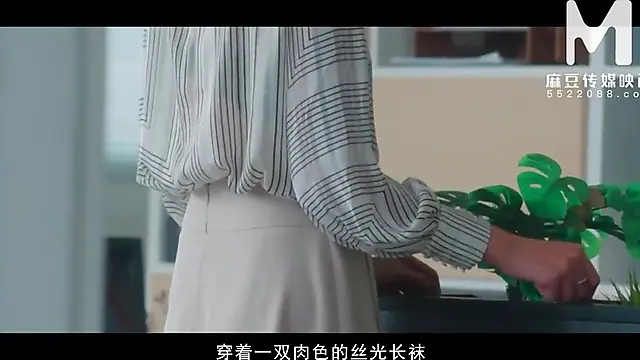 A tattooed Chinese MILF, gets fucked at the office
